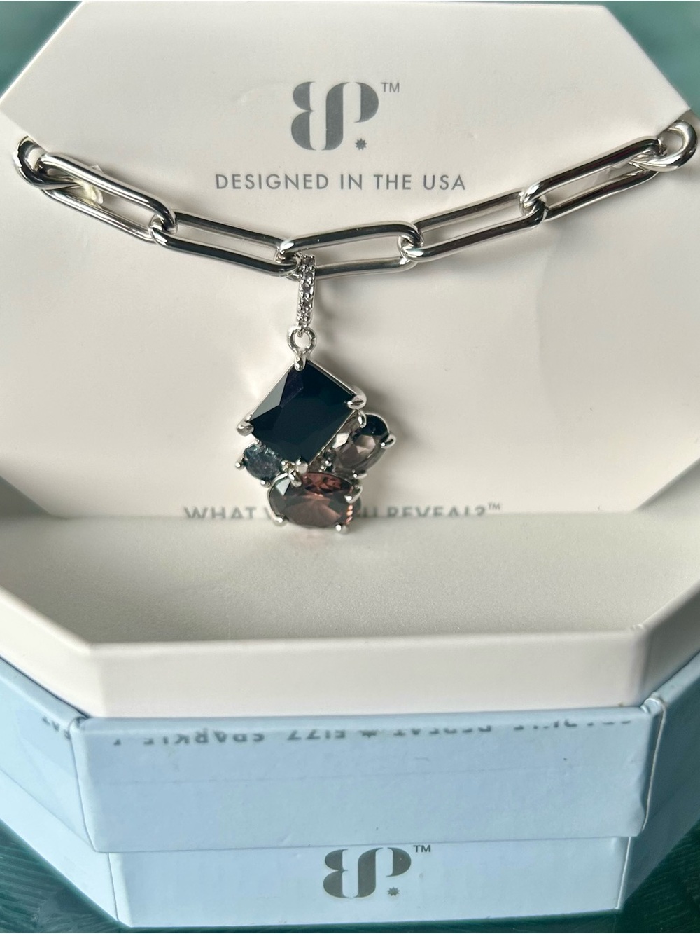 BP OG smoky quartz & black onyx cubic zirconia on rhodium plating.